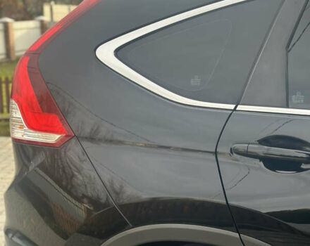 Хонда СРВ 2013 в Тысменице на Automoto.ua Черный Хонда СРВ, объемом двигателя 2.2 л и пробегом 275 тыс. км за 14600 $, фото 30 на Automoto.ua