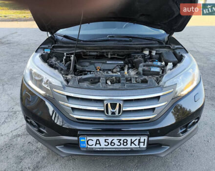 Черный Хонда СРВ, объемом двигателя 1.6 л и пробегом 326 тыс. км за 14400 $, фото 1 на Automoto.ua
