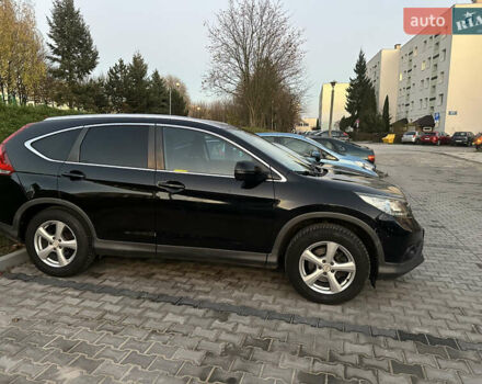 Черный Хонда СРВ, объемом двигателя 2.2 л и пробегом 235 тыс. км за 13000 $, фото 1 на Automoto.ua