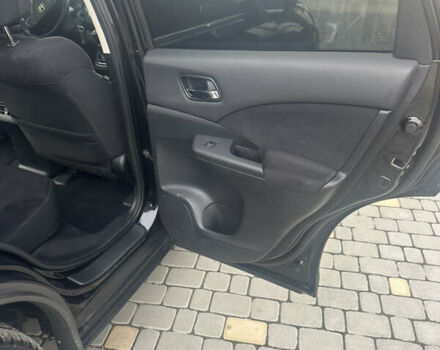 Хонда СРВ 2013 в Тысменице на Automoto.ua Черный Хонда СРВ, объемом двигателя 2.2 л и пробегом 275 тыс. км за 14600 $, фото 22 на Automoto.ua