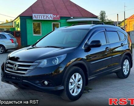 Черный Хонда СРВ, объемом двигателя 2.4 л и пробегом 148 тыс. км за 14380 $, фото 1 на Automoto.ua