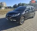 Черный Хонда СРВ, объемом двигателя 2.36 л и пробегом 220 тыс. км за 15900 $, фото 1 на Automoto.ua