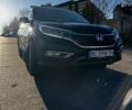 Черный Хонда СРВ, объемом двигателя 2.35 л и пробегом 250 тыс. км за 20000 $, фото 1 на Automoto.ua
