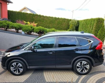 Черный Хонда СРВ, объемом двигателя 2 л и пробегом 141 тыс. км за 9800 $, фото 1 на Automoto.ua