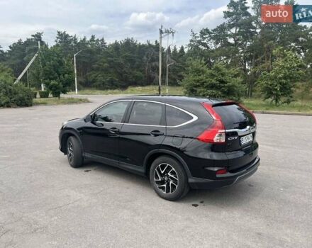 Черный Хонда СРВ, объемом двигателя 2.35 л и пробегом 190 тыс. км за 17000 $, фото 1 на Automoto.ua