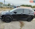 Черный Хонда СРВ, объемом двигателя 1.6 л и пробегом 155 тыс. км за 21900 $, фото 1 на Automoto.ua