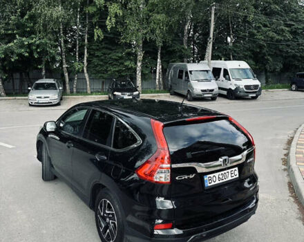 Черный Хонда СРВ, объемом двигателя 2.36 л и пробегом 160 тыс. км за 14500 $, фото 2 на Automoto.ua