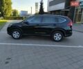 Черный Хонда СРВ, объемом двигателя 2.35 л и пробегом 126 тыс. км за 16200 $, фото 1 на Automoto.ua