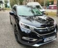 Черный Хонда СРВ, объемом двигателя 1.6 л и пробегом 155 тыс. км за 21900 $, фото 1 на Automoto.ua