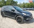 Черный Хонда СРВ, объемом двигателя 2.36 л и пробегом 77 тыс. км за 3800 $, фото 1 на Automoto.ua