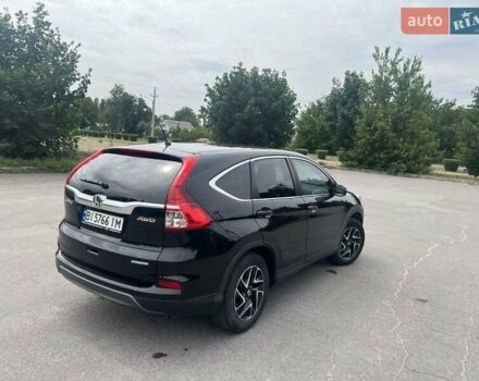 Черный Хонда СРВ, объемом двигателя 2.35 л и пробегом 190 тыс. км за 17000 $, фото 3 на Automoto.ua