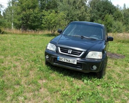 Черный Хонда СРВ, объемом двигателя 2 л и пробегом 250 тыс. км за 3500 $, фото 1 на Automoto.ua