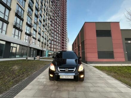 Черный Хонда СРВ, объемом двигателя 2.4 л и пробегом 260 тыс. км за 7000 $, фото 1 на Automoto.ua