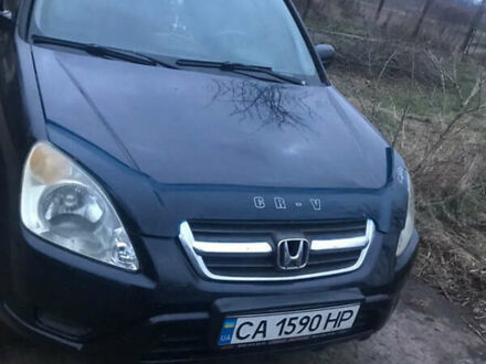 Черный Хонда СРВ, объемом двигателя 2 л и пробегом 190 тыс. км за 3600 $, фото 1 на Automoto.ua