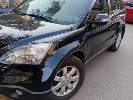Черный Хонда СРВ, объемом двигателя 2.35 л и пробегом 234 тыс. км за 9700 $, фото 1 на Automoto.ua