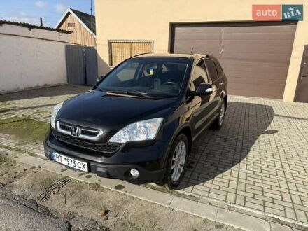 Черный Хонда СРВ, объемом двигателя 2.35 л и пробегом 258 тыс. км за 13500 $, фото 1 на Automoto.ua