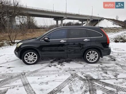 Черный Хонда СРВ, объемом двигателя 2.4 л и пробегом 253 тыс. км за 11000 $, фото 1 на Automoto.ua