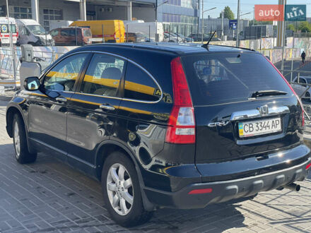 Черный Хонда СРВ, объемом двигателя 2.35 л и пробегом 273 тыс. км за 12000 $, фото 1 на Automoto.ua