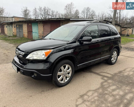 Черный Хонда СРВ, объемом двигателя 2.35 л и пробегом 240 тыс. км за 6900 $, фото 1 на Automoto.ua