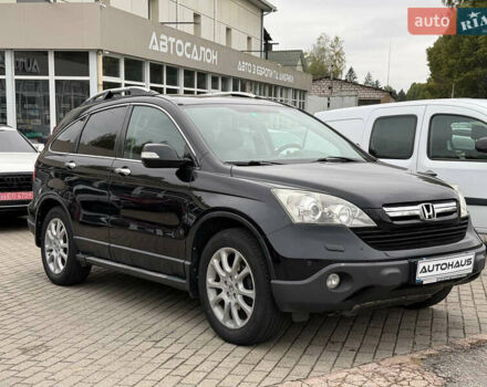 Черный Хонда СРВ, объемом двигателя 2.35 л и пробегом 226 тыс. км за 10800 $, фото 1 на Automoto.ua