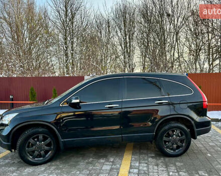 Черный Хонда СРВ, объемом двигателя 2.4 л и пробегом 203 тыс. км за 10400 $, фото 1 на Automoto.ua