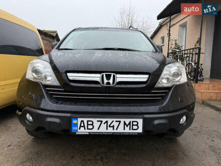 Черный Хонда СРВ, объемом двигателя 2.35 л и пробегом 141 тыс. км за 13000 $, фото 1 на Automoto.ua