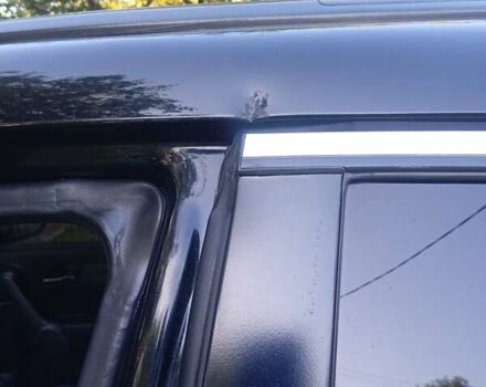 Черный Хонда СРВ, объемом двигателя 2.35 л и пробегом 145 тыс. км за 10500 $, фото 1 на Automoto.ua