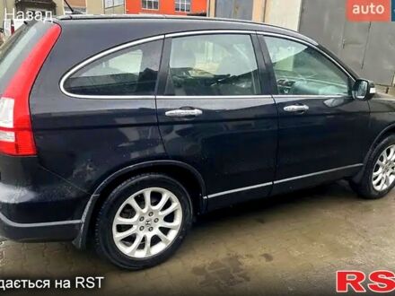 Черный Хонда СРВ, объемом двигателя 2 л и пробегом 252 тыс. км за 9800 $, фото 1 на Automoto.ua