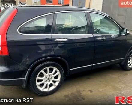 Черный Хонда СРВ, объемом двигателя 2 л и пробегом 252 тыс. км за 9800 $, фото 1 на Automoto.ua