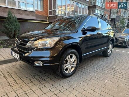 Черный Хонда СРВ, объемом двигателя 2.35 л и пробегом 239 тыс. км за 10700 $, фото 1 на Automoto.ua