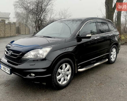 Черный Хонда СРВ, объемом двигателя 2.35 л и пробегом 203 тыс. км за 13800 $, фото 1 на Automoto.ua