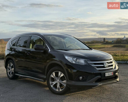 Черный Хонда СРВ, объемом двигателя 2.2 л и пробегом 135 тыс. км за 20500 $, фото 1 на Automoto.ua