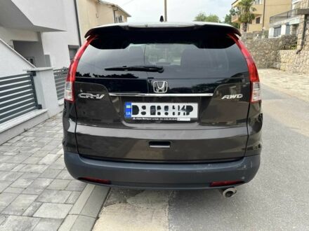 Черный Хонда СРВ, объемом двигателя 2.35 л и пробегом 155 тыс. км за 13300 $, фото 1 на Automoto.ua