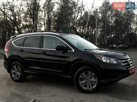 Черный Хонда СРВ, объемом двигателя 2.35 л и пробегом 219 тыс. км за 13560 $, фото 1 на Automoto.ua