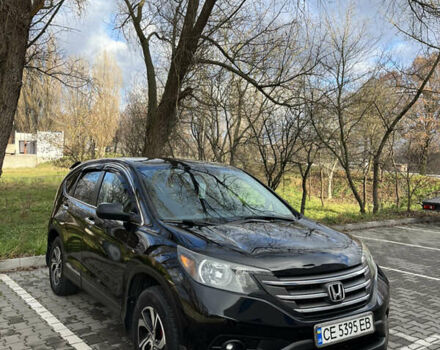 Черный Хонда СРВ, объемом двигателя 2.4 л и пробегом 197 тыс. км за 13500 $, фото 1 на Automoto.ua