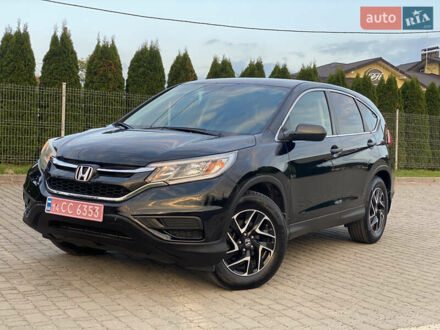 Черный Хонда СРВ, объемом двигателя 2.36 л и пробегом 165 тыс. км за 17800 $, фото 1 на Automoto.ua