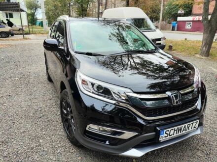 Черный Хонда СРВ, объемом двигателя 1.6 л и пробегом 155 тыс. км за 21900 $, фото 1 на Automoto.ua
