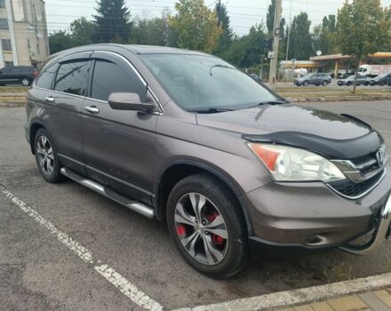 Коричневый Хонда СРВ, объемом двигателя 2.4 л и пробегом 330 тыс. км за 10300 $, фото 1 на Automoto.ua