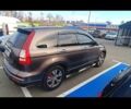 Коричневый Хонда СРВ, объемом двигателя 24 л и пробегом 380 тыс. км за 11000 $, фото 1 на Automoto.ua