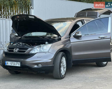 Коричневый Хонда СРВ, объемом двигателя 2.35 л и пробегом 201 тыс. км за 14700 $, фото 1 на Automoto.ua
