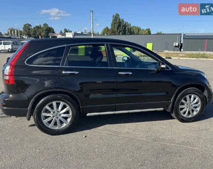 Коричневый Хонда СРВ, объемом двигателя 2 л и пробегом 256 тыс. км за 12750 $, фото 1 на Automoto.ua