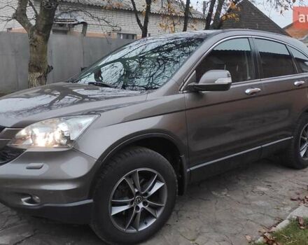 Коричневый Хонда СРВ, объемом двигателя 2.2 л и пробегом 232 тыс. км за 14700 $, фото 1 на Automoto.ua