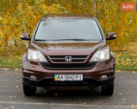 Коричневый Хонда СРВ, объемом двигателя 2.35 л и пробегом 132 тыс. км за 15000 $, фото 1 на Automoto.ua