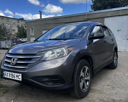 Коричневый Хонда СРВ, объемом двигателя 2.35 л и пробегом 210 тыс. км за 12400 $, фото 1 на Automoto.ua