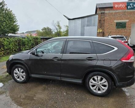 Коричневый Хонда СРВ, объемом двигателя 2.35 л и пробегом 147 тыс. км за 15700 $, фото 1 на Automoto.ua