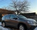 Коричневый Хонда СРВ, объемом двигателя 2.4 л и пробегом 200 тыс. км за 13800 $, фото 1 на Automoto.ua