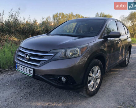 Коричневый Хонда СРВ, объемом двигателя 2.35 л и пробегом 230 тыс. км за 13250 $, фото 1 на Automoto.ua