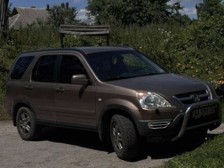 Коричневый Хонда СРВ, объемом двигателя 2 л и пробегом 316 тыс. км за 5700 $, фото 1 на Automoto.ua