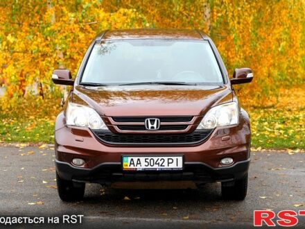 Коричневый Хонда СРВ, объемом двигателя 2.4 л и пробегом 132 тыс. км за 15000 $, фото 1 на Automoto.ua