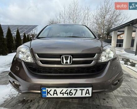 Коричневый Хонда СРВ, объемом двигателя 2.35 л и пробегом 255 тыс. км за 12950 $, фото 1 на Automoto.ua